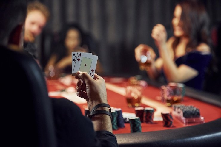 Layar permainan Live Baccarat sportsbet menampilkan tangan Pemain dan Banker